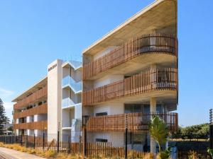 an external view of a building with balconies at Burleigh Ballito in Ballito