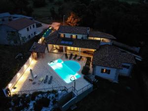 an overhead view of a house with a swimming pool at Charming Villa near Žminj with Private Pool in Žminj