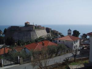 a town with a castle on top of a hill at Sea View Apartment Ulcinj 80 m² in Ulcinj +59 photos