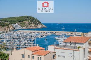 a view of a harbor with boats in the water at Casa Terral in Palamós
