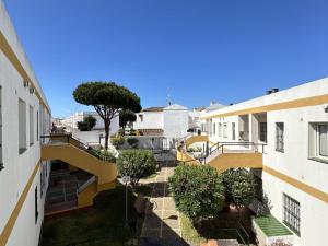 a view from the balcony of a building at Los Pescadores Playa Sol in Novo Sancti Petri