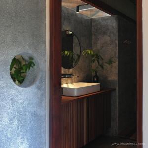 a bathroom with a sink and a mirror at Haven Nest Retreat in Ấp Phú Hòa (3) +42 photos