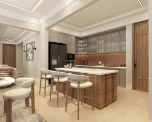 a kitchen with a large island with bar stools at Silk Path Dong Trieu Golf Course & Villas in Trại Sưu