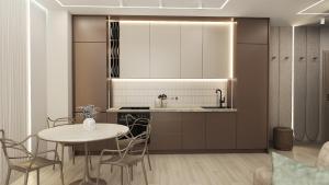a kitchen and dining room with a table and chairs at Apartamenty Kościuszki Winda Klimatyzacja in Iława