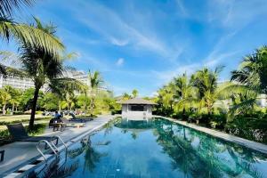 a pool at the resort at Nova Villas Phu Quoc in Phú Quốc