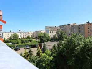 a view of a parking lot in a city with buildings at Ferienwohnung MIWE Gesundheitszent in Forst