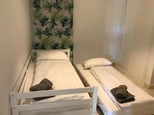 two bunk beds in a small room with a wall at Spacious Apartment with Views in Málaga, 77 m², Shared Pool in San Luis de Sabinillas