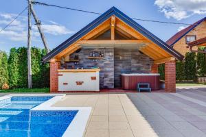 a house with a kitchen and a pool at Peaceful Villa in Gornje Dubrave with Private Pool in Gornje Dubrave