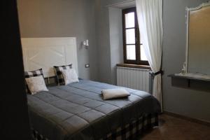 Postel nebo postele na pokoji v ubytování Gombereto 10 + 19 fotografií