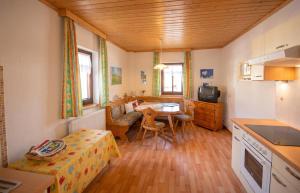 a small room with a kitchen and a dining room at Charming House in Pruggern, Mountain View in Pruggern +27 photos