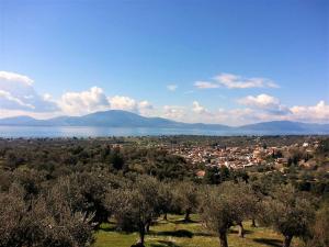 a view of a city and a town with trees at Elegant Villa with Sea View in Politika in Politika
