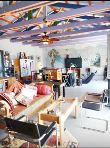 a living room with a couch and chairs and a ceiling at Elegant Villa with Sea View in Politika in Politika +45 photos