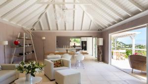 a living room with a white coffered ceiling at Heavenly Villa in Gustavia with Private Pool in Gustavia +29 photos
