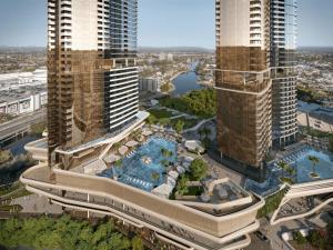 an aerial view of a resort with two tall buildings at OMI Collection Broadbeach in Gold Coast