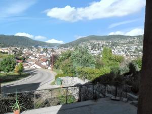 a view from the balcony of a house at Studio convivial à Gérardmer, 35 m² avec vue sur la montagne in Gérardmer +17 photos