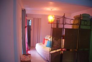 a bedroom with a bunk bed in a room at Studio avec vue sur la mer à Fort-de-France 50 m² exceptionnel ! in Fort-de-France