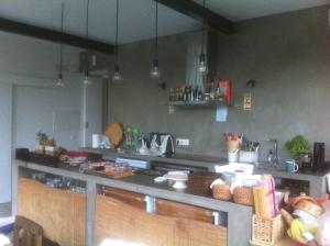 a kitchen with a counter with some food on it at Picturesque Villa in Santo António das Areias with Private Pool in Marvão