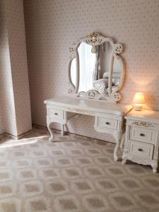 a white dressing table with a mirror on top of it at Coastal Studio with Sea View in Elenite, 40m² + Pool in Elenite