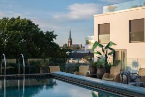 a swimming pool on the roof of a building at Sommerro in Oslo