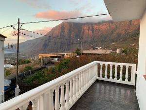 a balcony with a view of a mountain at Cozy apartment with sea view in Frontera in Frontera