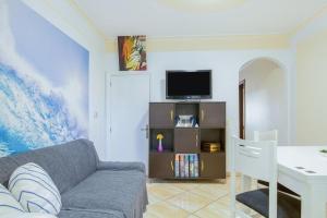 a living room with a couch and a table at Charming House in Costa Calma with Mountain View and Terrace in Costa Calma