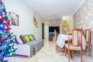 a living room with a christmas tree and a couch at Charming House in Costa Calma with Mountain View and Terrace in Costa Calma