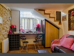 a room with a kitchen with a sink and a counter at Charming villa in Cividade, 150 m² with private pool in Cividade