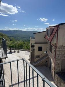 a balcony of a building with mountains in the background at Art & Breakfast in Ripabottoni