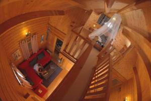 an overhead view of a living room with a red couch at Charming Bungalow in Tarifa with Mountain View in Tarifa