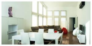 a living room with a couch and a table at Elegant Villa in Outes with Pool in Serantes