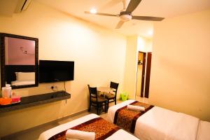 TV a/nebo společenská místnost v ubytování Hotel Seremban Jaya
