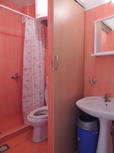a bathroom with a toilet and a sink at Modern Studio with Sea View - Ulcinj - 25 m² - Balcony in Ulcinj