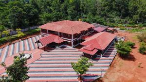 an overhead view of a building with red roofs at Apoorva River Resort in Māvingundi