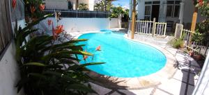 a swimming pool in a backyard at Spacious Apartment in Pamplemousses with Private Pool in Pamplemousses Village