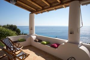 a balcony with a view of the ocean at House with garden and sea view in Lipari in Lipari