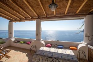 a balcony with a view of the ocean at House with garden and sea view in Lipari in Lipari