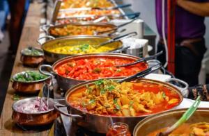 a buffet filled with lots of different types of food at The Golden Plaza in Tarapith
