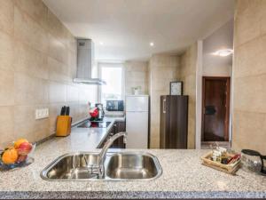 Kuchyňa alebo kuchynka v ubytovaní Apartamento Playamar