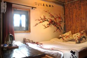 Una cama o camas en una habitación de Old Street Courtyard (Free Pick up Service)