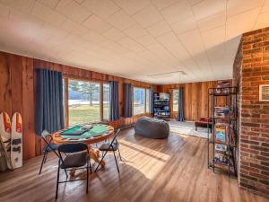 a living room with a table and chairs at Modern Stunning Private Flat Lakefront in Oakland