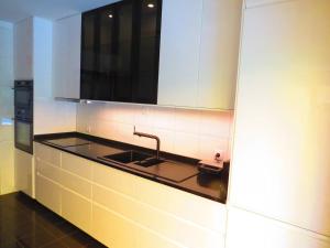 a kitchen with a sink and a counter top at Elegant Villa in Porto with Pool & Jacuzzi in Porto
