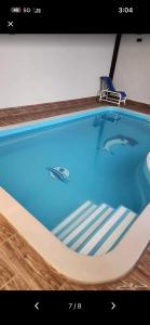 a picture of a swimming pool in a room at ريفون in Tabuk