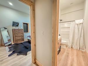 a bathroom with a mirror and a sink and a toilet at Stunning New Construction Modern Beautiful in McHenry +42 photos