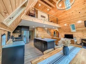 a kitchen with wooden walls and wooden flooring at Stunning New Construction Modern Beautiful in McHenry