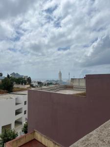 a view of the city from the roof of a building at Hrich house in Fnidek