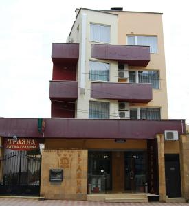 a building with balconies on the side of it at Hotel Trayana in Stara Zagora