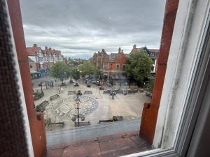 a view of a city square from a window at Auberge Hotel by Sasco in Lytham St Annes +81 photos