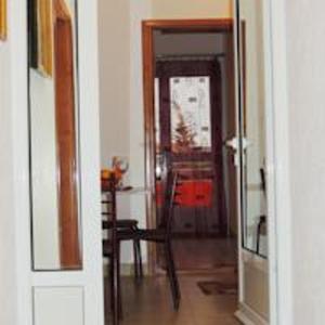 a hallway with a door leading to a dining room at Sea View Apartment - Ulcinj - 40 sqm in Ulcinj