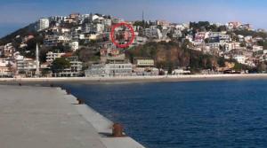 a red circle in the air over a beach at Sea View Apartment - Ulcinj - 40 sqm in Ulcinj