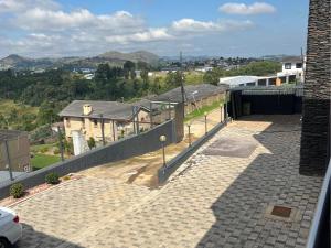 a view of a balcony of a house at Vista Royale Luxury Villas in Mbabane